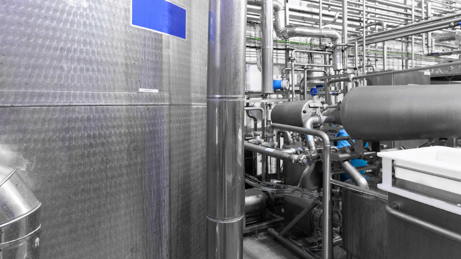 Static mixer: factory interior stainless tanks + piping (brewing)
